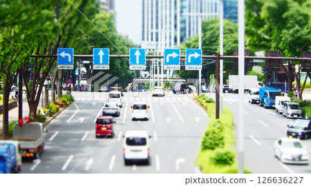 Cars driving on a main road in the city Cars driving on a main road in the city 126636227