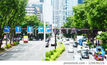 Cars driving on a main road in the city Cars driving on a main road in the city 126636228