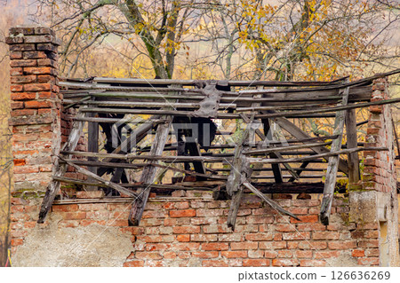 Burnt old building roof 126636269