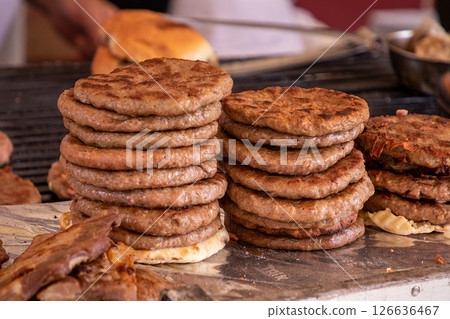 Grilled hamburgers stack sold on market 126636467