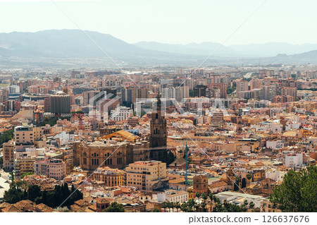 Scenic cityscape with historic architecture and mountain backdrop. Scenic cityscape with historic architecture and mountain backdrop. 126637676