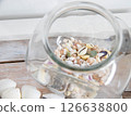 Seashells in a glass jar 126638800