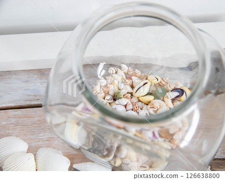 Seashells in a glass jar Seashells in a glass jar 126638800