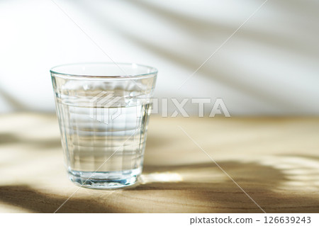 Cold water on a table in the sun Cold water on a table in the sun 126639243