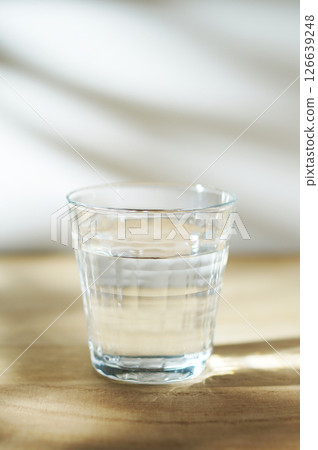 Cold water on a table in the sun Cold water on a table in the sun 126639248