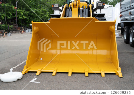 Buckets construction excavator on sky 126639285