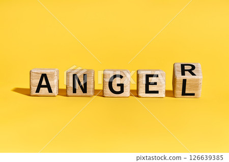 Wooden blocks forming words ANGEL to ANGER over yellow background. Wooden blocks forming words ANGEL to ANGER over yellow background. 126639385