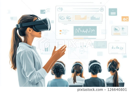 Woman wearing virtual reality headset demonstrates technology to engaged audience in modern classroom 126640801