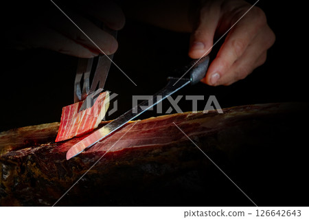 Dry Spanish ham, Jamon Serrano, Bellota, Italian Prosciutto Crudo or Parma ham. 126642643