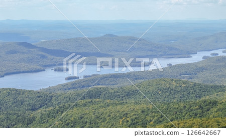 Aerial View of New Hampshire Mountain Lake Winnipesaukee in Vibrant Autumn Colors 126642667