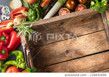 A variety of vegetables including tomatoes, onions, and green beans. A variety of vegetables including tomatoes, onions, and green beans. 126642686