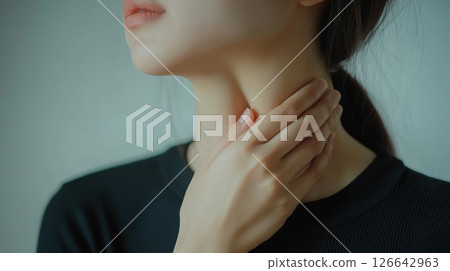 Close-Up Of Young Woman Touching Her Neck. Healthcare Concept. Sore Throat, Thyroid Gland Problem. 126642963