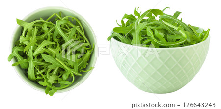 Heap of green fresh rucola or arugula leaf in ceramic bowl isolated on white background. Top view, flat lay 126643243