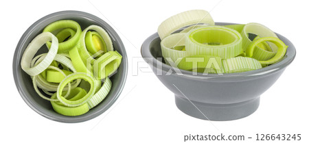 sliced Leek vegetable in ceramic bowl isolated on white background. Top view. Flat lay 126643245