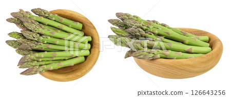 fresh asparagus in wooden bowl isolated on white background. Top view. Flat lay fresh asparagus in wooden bowl isolated on white background. Top view. Flat lay 126643256