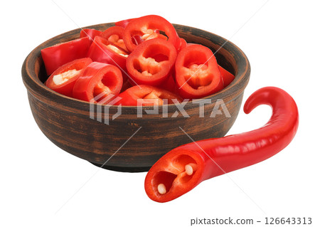 red hot chili pepper slices in wooden bowl isolated on white background 126643313