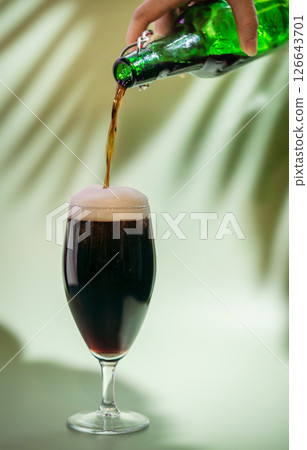 Glass of dark beer Glass of dark beer 126643701