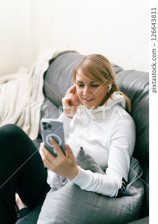 woman using smartphone woman using smartphone 126643811