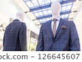 Male mannequins in elegant suits with a ties 126645607