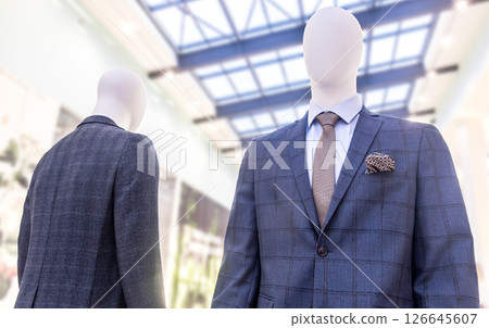 Male mannequins in elegant suits with a ties 126645607