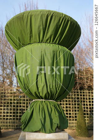 Statues and sculptures are wrapped in a blanket for protection during the autumn-winter season. 126645667