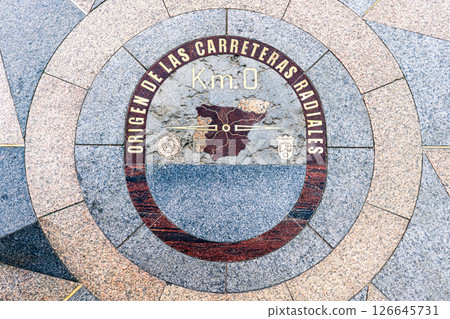 Kilometer Zero Marker at Puerta del Sol in Madrid, Spain. Symbolic Starting Point of Spanish Roads Kilometer Zero Marker at Puerta del Sol in Madrid, Spain. Symbolic Starting Point of Spanish Roads 126645731
