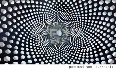 A patterned piece with the repetition and arrangement of dots creating a mesmerizing optical illusion 126647214