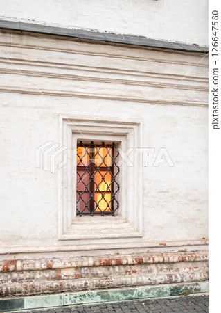 illuminated window in wall in Andronikov Monastery illuminated window in wall in Andronikov Monastery 126647580