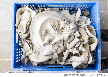 fragments of unfired porcelain in plastic box fragments of unfired porcelain in plastic box 126647937