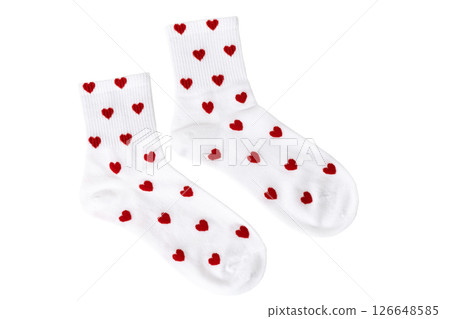 White socks with red heart patterns on white background White socks with red heart patterns on white background 126648585