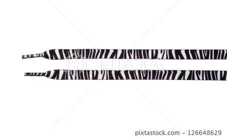 Black and white zebra stripe shoelaces on white background 126648629