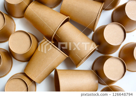 Brown paper cups on white background. Brown paper cups on white background. 126648794