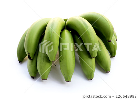 Green banana fruits on white background. Green banana fruits on white background. 126648982