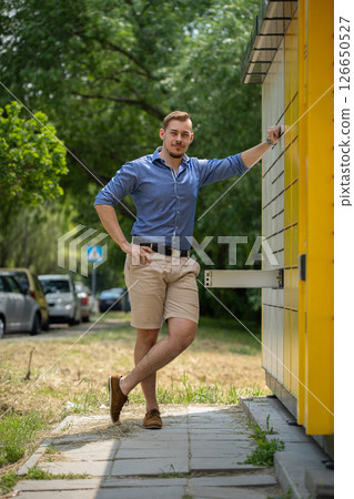 Delighting in the Casual and Relaxing Summer Vibes of Nature with a Stylish, Handsome Man Outdoors 126650527