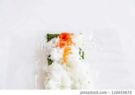Making fluffy rice balls with cod roe Making fluffy rice balls with cod roe 126650676