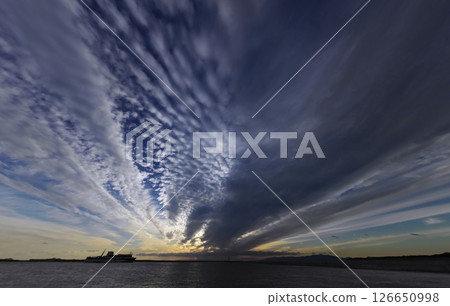 Evening sky with radial clouds and harbor, autumn, ultra-wide angle, sky-focused, 241030pm Evening sky with radial clouds and harbor, autumn, ultra-wide angle, sky-focused, 241030pm 126650998