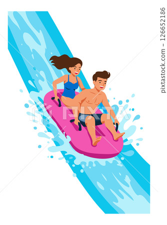 Young couple riding pink inflatable tube down water slide in summer fun activity 126652186