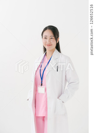 A woman in a white coat A woman in a white coat 126652516