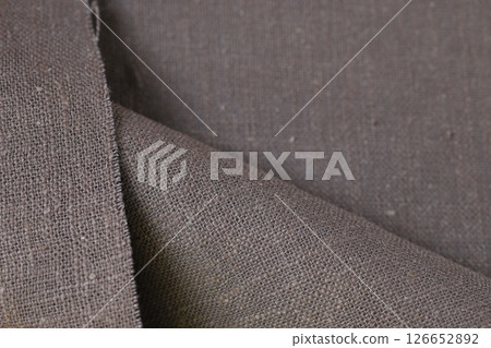 drak brown hemp viscose natural fabric cloth color, sackcloth rough texture of textile fashion 126652892