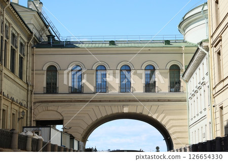A Historic Archway That Serves as an Impressive Connection Between Buildings in a Cityscape A Historic Archway That Serves as an Impressive Connection Between Buildings in a Cityscape 126654330