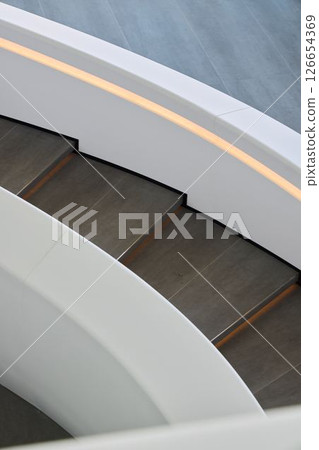 Curved Wooden Steps Integrating with a Contemporary Modern Architectural Design Concept 126654369