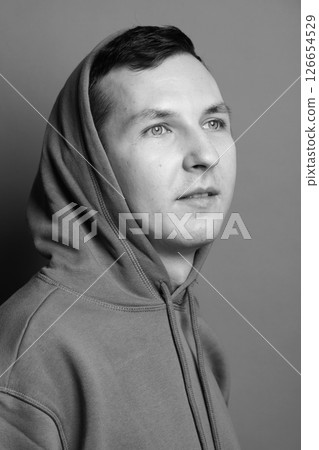 Contemplative Individual in Hoodie A Striking Monochrome Portrait Capturing Modern Spirit Contemplative Individual in Hoodie A Striking Monochrome Portrait Capturing Modern Spirit 126654529