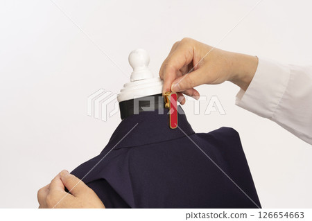 Dressing a child in formal attire for Shichigosan: The process of dressing a 5-year-old boy in formal attire Dressing a child in formal attire for Shichigosan: The process of dressing a 5-year-old boy in formal attire 126654663