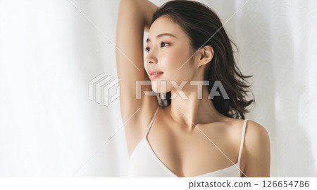 A woman in a white camisole showing her armpits, a clean and fresh summer beauty image (beauty, beauty salon, hair removal, cosmetics) A woman in a white camisole showing her armpits, a clean and fresh summer beauty image (beauty, beauty salon, hair removal, cosmetics) 126654786