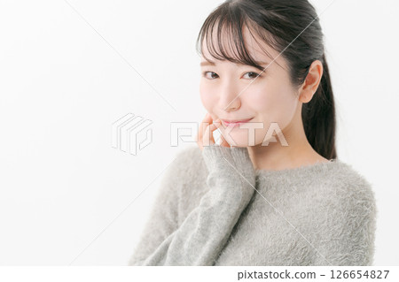 Portrait of a woman doing skin care 126654827