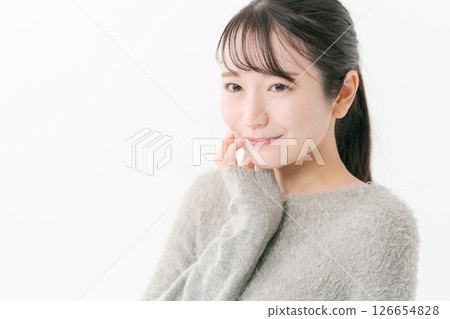 Portrait of a woman doing skin care 126654828
