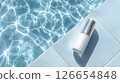 White cosmetic containers placed by sparkling water - a minimalist summer presentation (beauty, skincare, basic cosmetics) 126654848