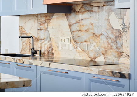 An Elegant and Stylish Kitchen Featuring a Stunning Marble Backsplash and Modern Design Elements An Elegant and Stylish Kitchen Featuring a Stunning Marble Backsplash and Modern Design Elements 126654927