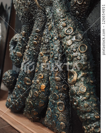 An Intricate Octopus Sculpture Featuring Unique Textures and Patterns That Captivate 126654951