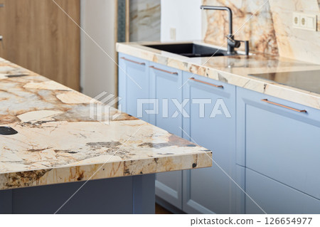 Discover an Elegant Kitchen Design Featuring Stunning Marble Countertops and More 126654977